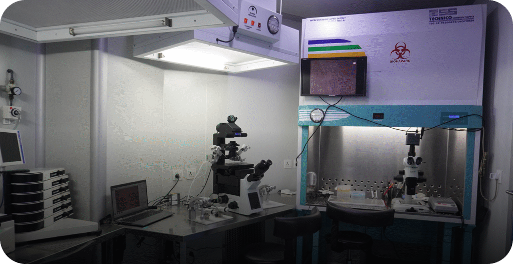 Wide view of the advanced embryology laboratory with micromanipulation microscope and sterile laminar flow workstations. - AAS Fertility